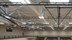 Close up of steel joist and deck ceiling over gymnasium