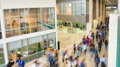 Busy high school hallway showing rooms on mulitple levels