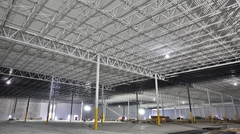 Wide shot of warehouse interior showing painted steel joists and joist girders